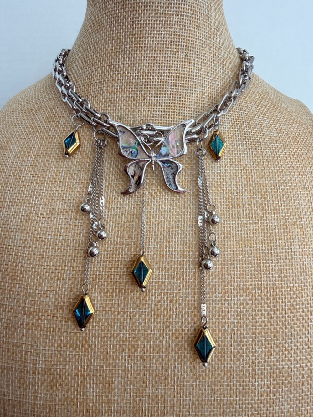 Silver Butterfly Statement Necklace with Iridescent and Teal Accents